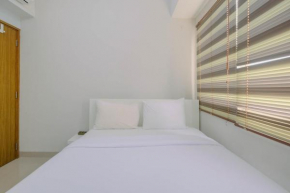 Minimalist and Posh 1BR The Oasis Cikarang Apartment By Travelio